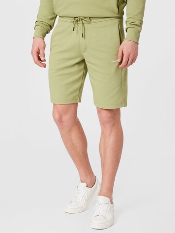 Calvin Klein Regular Pants in Green: front