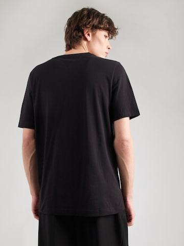 T-Shirt 'BRAND LOVE' TOMMY HILFIGER en noir