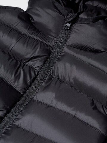 MANGO KIDS Prehodna jakna 'Unicob' | črna barva