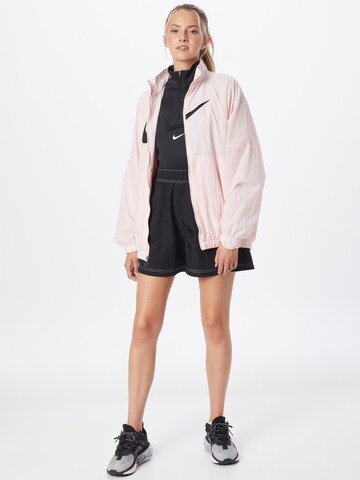 Nike Sportswear - Chaqueta de entretiempo 'Essential' en rosa