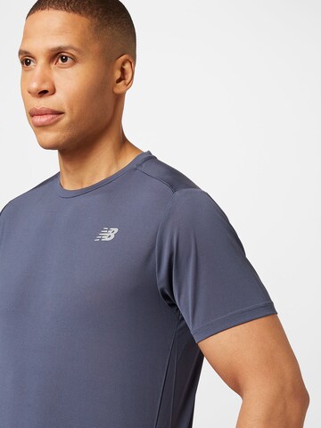 new balance - Camisa funcionais 'Accelerate' em azul