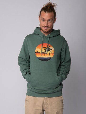 Sweat-shirt 'Sunset on palm beach' Watapparel en vert : devant