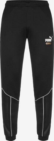Effilé Pantalon de sport 'King' PUMA en noir : devant