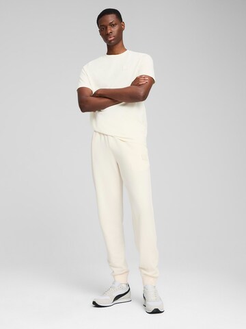 PUMA Bluser & t-shirts 'Essentials' i beige