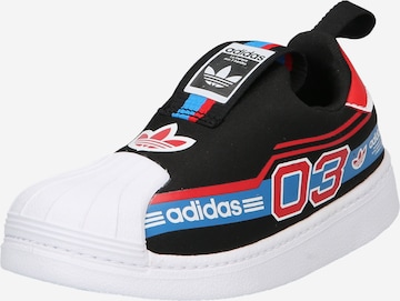 ADIDAS ORIGINALS Sneakers in Black: front