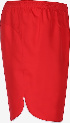 Loosefit Pantalon de sport NIKE en rouge