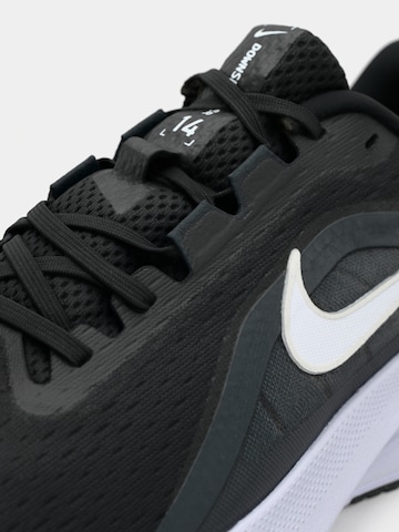 Chaussure de course 'DOWNSHIFTER 14' NIKE en noir
