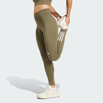ADIDAS PERFORMANCE Skinny Sports trousers 'Own the Run' in Green: front
