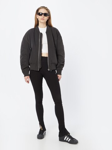 ALPHA INDUSTRIES Slim fit Leggings in Black