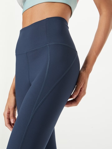 Girlfriend Collective Skinny Sporthose in Blau