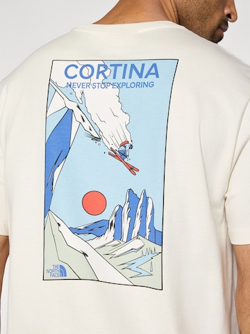 THE NORTH FACE Majica 'MOUNTAIN CELEBRATION' | bela barva