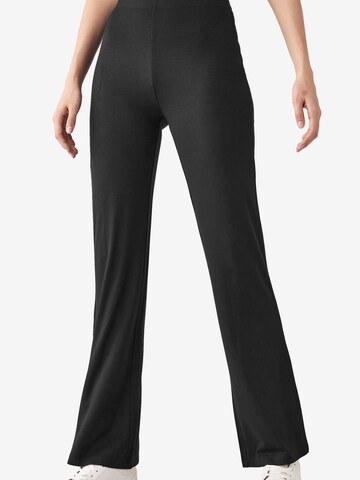 Next - Acampanado Leggings en negro