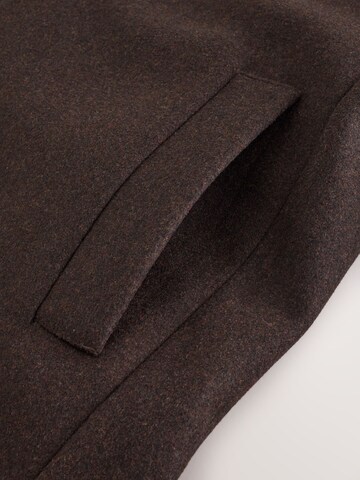 Next Tussenjas in Bruin