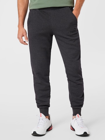 PUMA Tapered Sportbroek in Grijs: voorkant