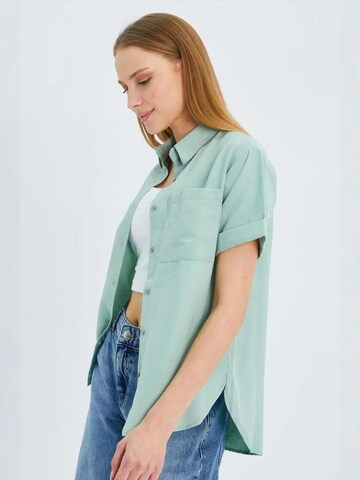 Maglietta di MixRay in verde