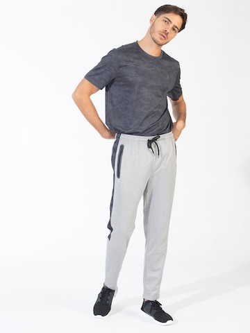 Slimfit Pantaloni sportivi di Spyder in grigio