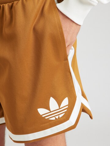 ADIDAS ORIGINALS Ohlapna forma Hlače | rjava barva