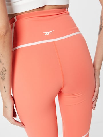 Reebok - Skinny Calças de desporto em laranja