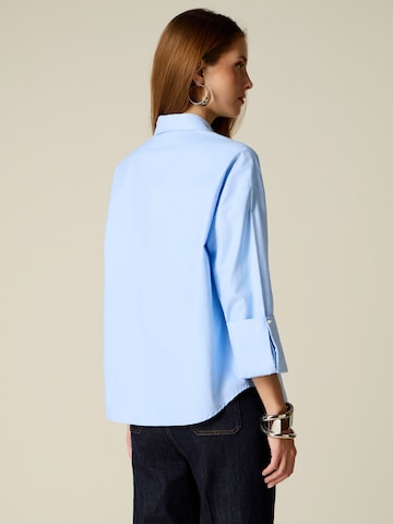 Camicia da donna di oltre in blu