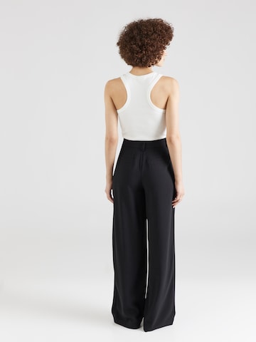 ABOUT YOU x Iconic by Tatiana Kucharova Loose fit Pleat-Front Pants 'Mathilda' in Black