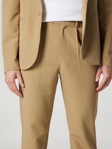 ABOUT YOU x Kevin Trapp Tapered Pleat-Front Pants 'Emil' in Brown
