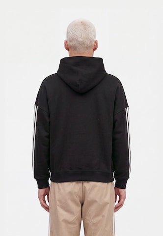 Bluză de molton de la ADIDAS ORIGINALS pe negru