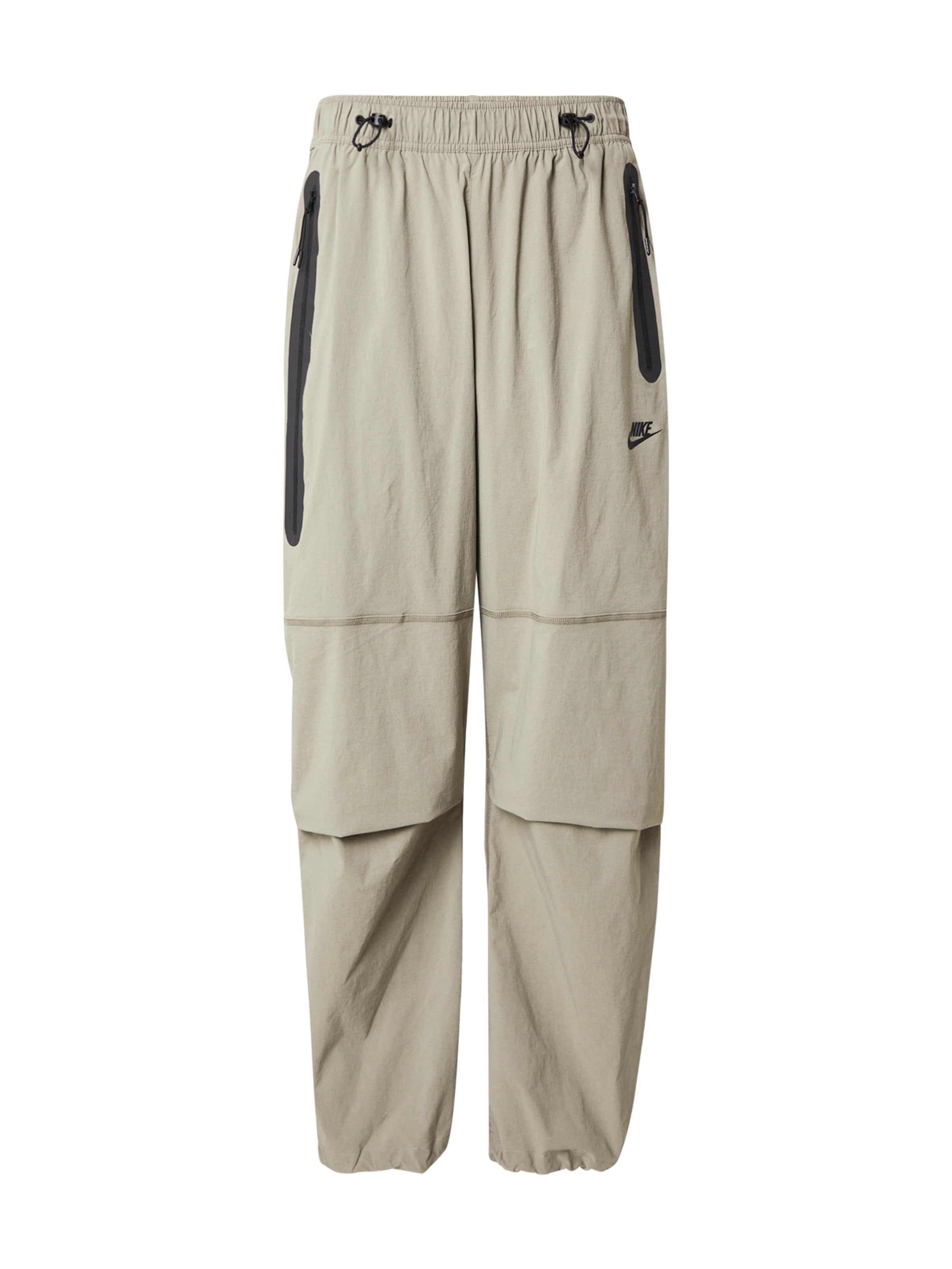 Nike Sportswear Spodnie 'Tech' w kolorze zielony: przód