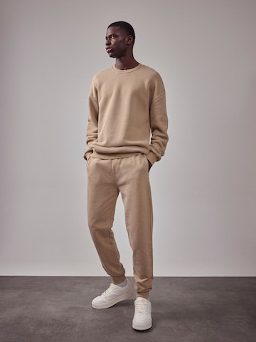 DAN FOX APPAREL Tapered Pants 'The Essential' in Beige