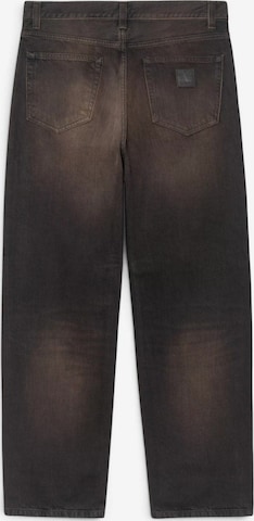 Carhartt WIP Baggy Trousers 'ARON PANT BLACK TOBACCO USED WASH' in Black: front