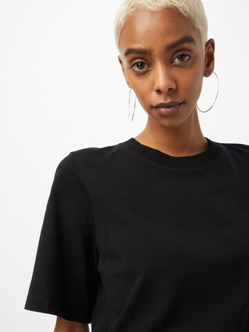Maglietta di UNITED COLORS OF BENETTON in nero