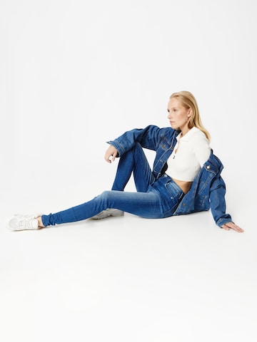 Tommy Jeans Kitsas Teksapüksid 'Sylvia', värv sinine