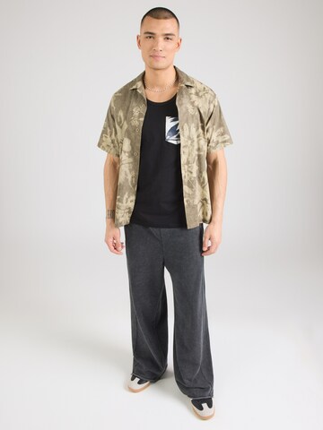 JACK & JONES - Camiseta 'JJHONOLULU' en negro