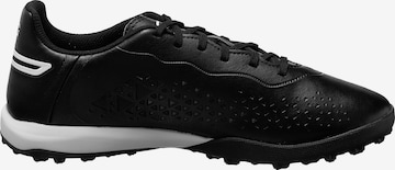 Chaussure de foot 'King Match TT' PUMA en noir