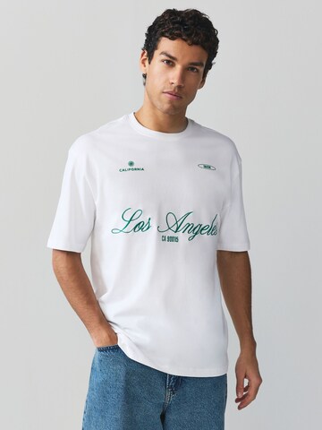 T-Shirt Next en bleu : devant