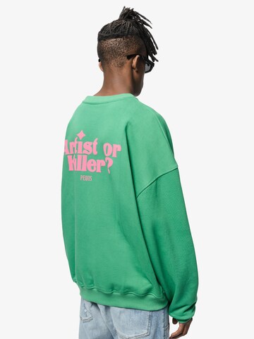 Pequs Sweatshirt 'Artist or Killer' in Grün