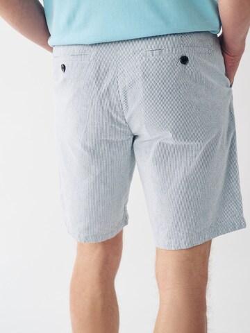 Next - regular Pantalón chino en azul