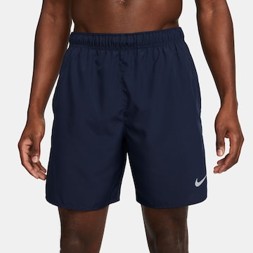 NIKE Workout Pants in Blue: front