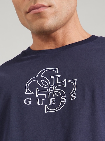 GUESS Bluser & t-shirts i blå