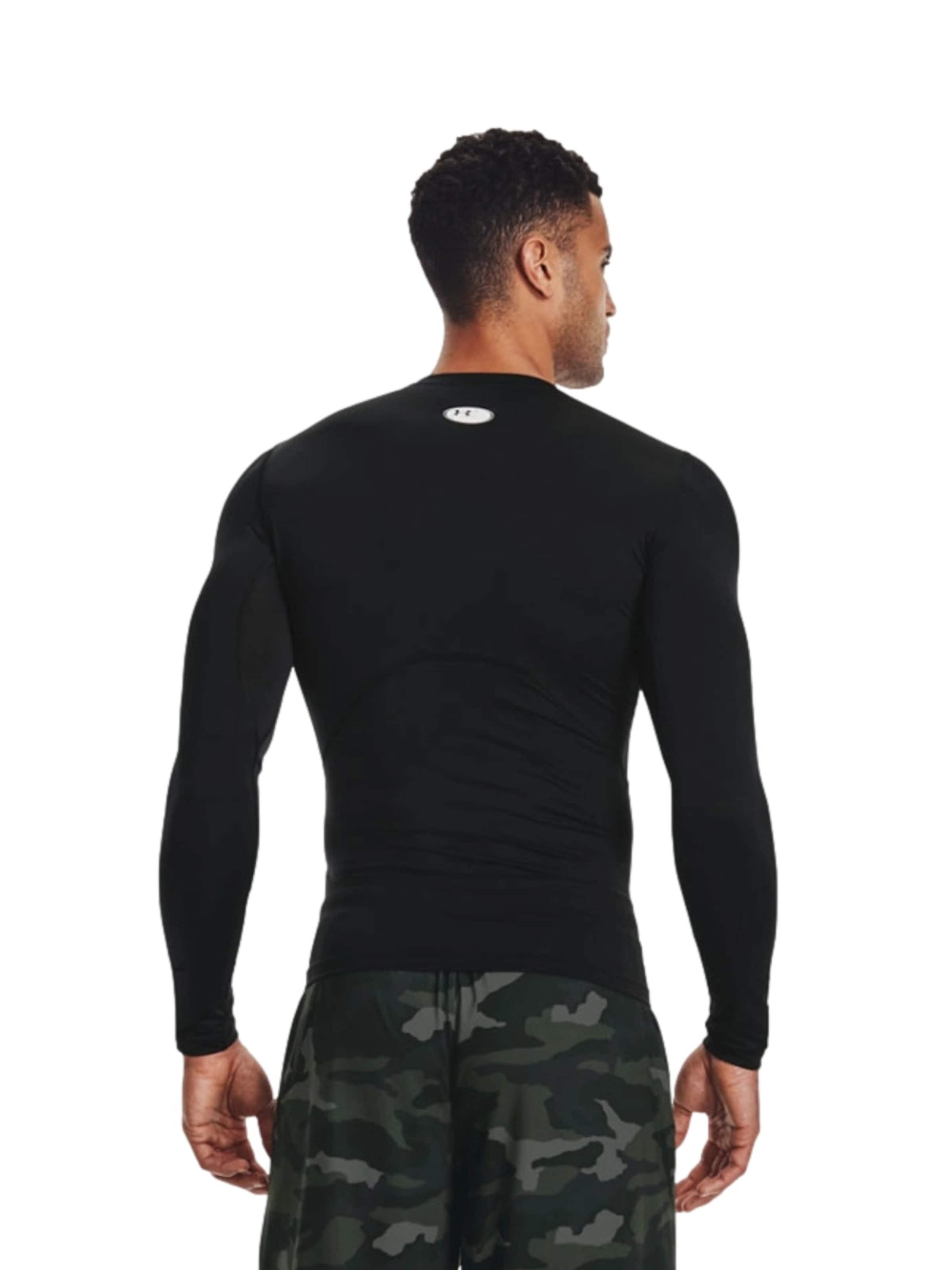 Maglietta di UNDER ARMOUR in nero