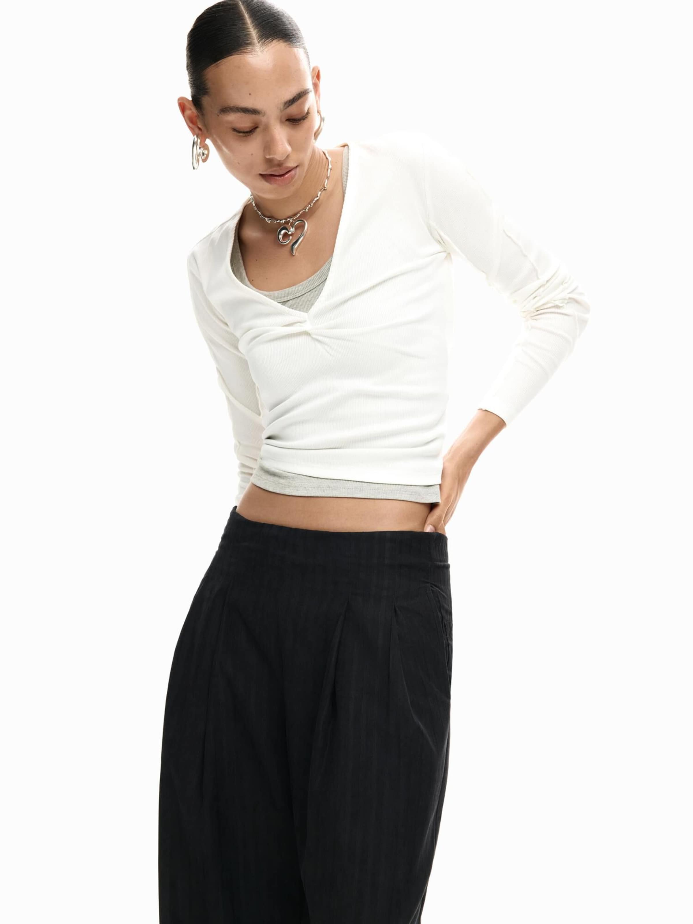 Wide leg Pantaloni con pieghe di Desigual in nero