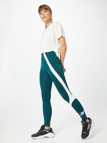 Reebok Skinny Športne hlače 'Vector' | zelena barva