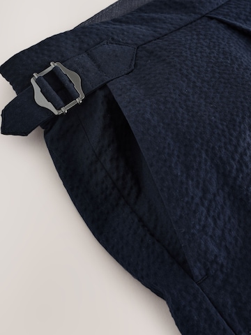 Slimfit Pantaloni con pieghe di Next in blu