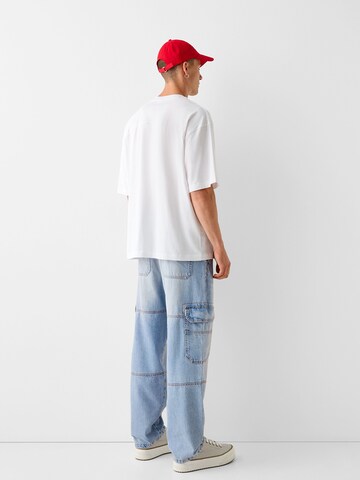 Bershka Loose fit Cargo jeans in Blue