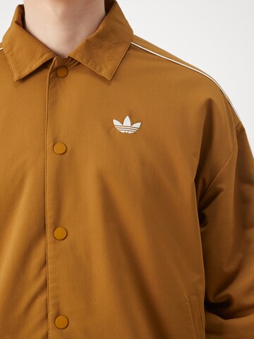 ADIDAS ORIGINALS Övergångsjacka i brun