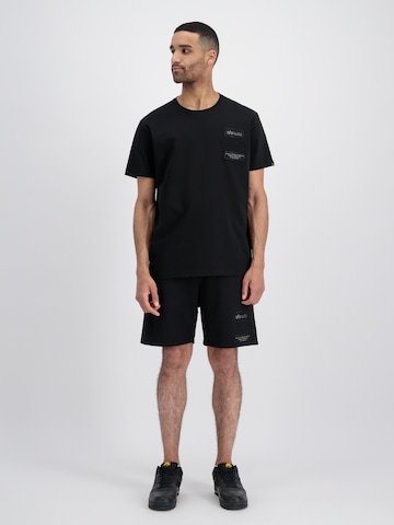 ALPHA INDUSTRIES - Loosefit Calças em preto