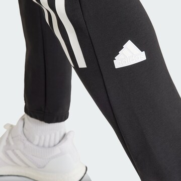 ADIDAS SPORTSWEAR - Tapered Pantalón deportivo 'Future Icons' en negro