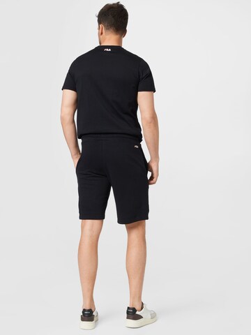 Regular Pantaloni sport 'BÜLTOW' de la FILA pe negru