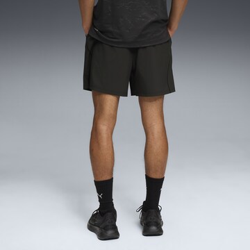 PUMA Regular Sports trousers in Black