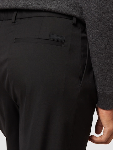 Calvin Klein Regular Pleat-front trousers in Black