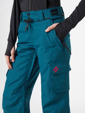 Superdry Snow Regular Sportbyxa 'ULTIMATE RESCUE' i blå